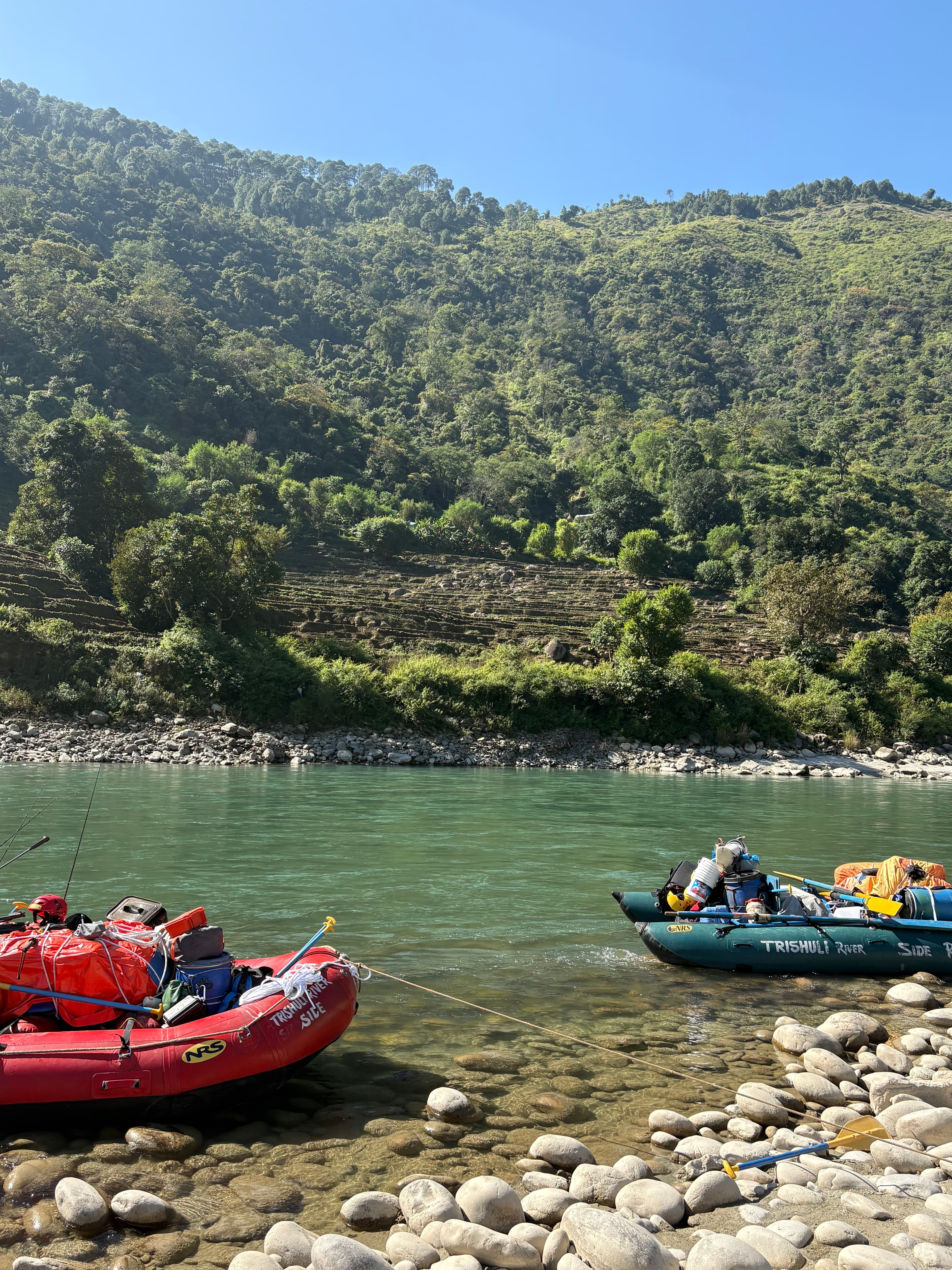 Boats and riverbank scenery in Nepal
