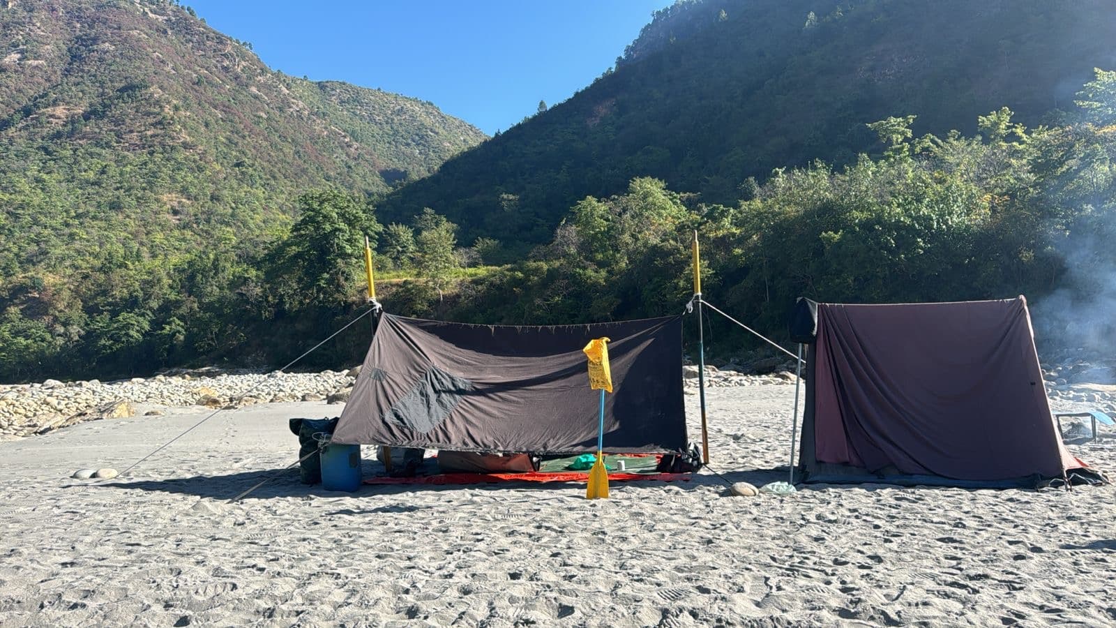 Fishing setup on calm green water in Nepal